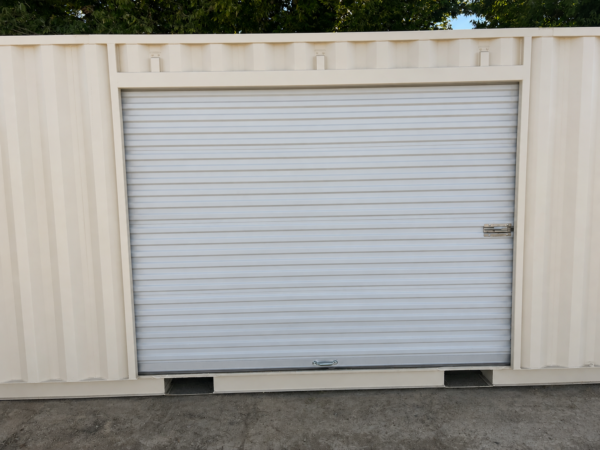 ChatGPT Image Jul 22, 2026, 11_20_51 PM 20ft Shipping Container with Roll-Up Side Door – New Storage Container